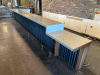 40' X 7' L SHAPED MELAMINE TOP BAR W/ 2" METAL FOOT RAIL.
