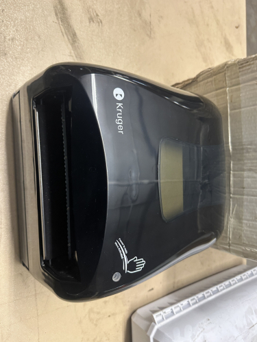 (1) NEW KRUGER PAPER TOWEL DISPENSER.