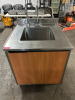 SINGLE WELL STAINLESS PREP SINK AND CABINET.