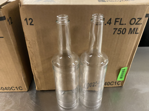 (12) 24 OZ GLASS BOTTLES.