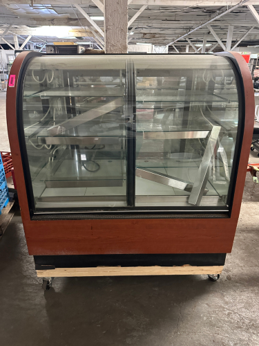 48" CURVED GLASS FRONT DRY DISPLAY CASE.