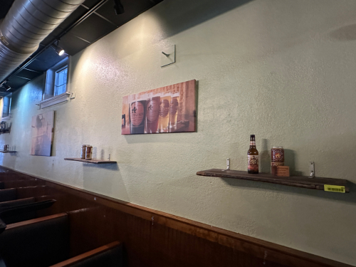 (3) WOODEN WALL SHELVES, (2) CANVAS PRINTS, AND ASSORTED BAR DECORATIONS.