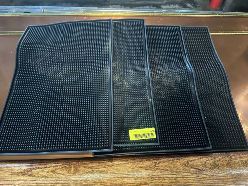 (4) BLACK RUBBER BAR MATS.
