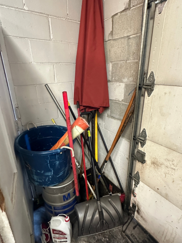 (1) LOT OF SHOVELS BROOMS, AND LONG HANDLE TOOLS.