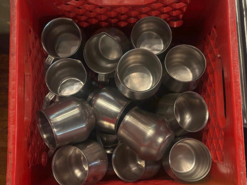 MILK CRATE AND CONTENTS - STAINLESS CREAMER DECANTERS