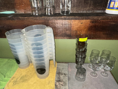 (1) LOT OF ASSORTED GLASSES AND PLASTIC PITCHERS.