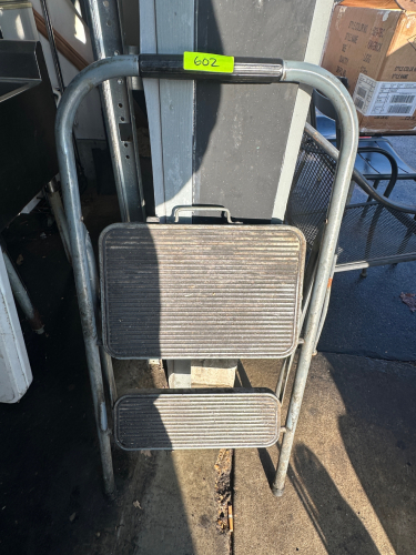 TWO STEP FOLDING LADDER.