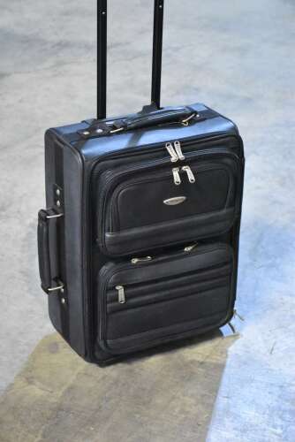 FULL LEATHER ROLLING CARRY ON SUITCASE