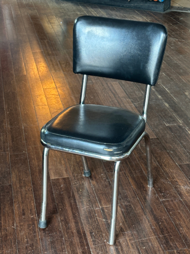 (4) BLACK PADDED CHAIRS W/ CHROME BASES.