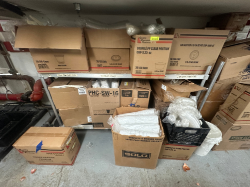 CONTENTS OF SHELF - A LARGE ASSORTMENT OF PAPER PRODUCT..