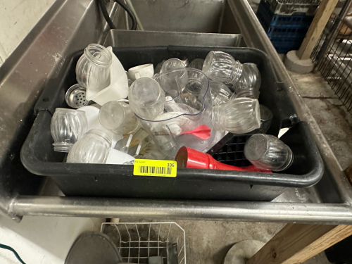 PLASTIC BUS TUB AND CONTENTS - ASSORTED CHEESE AND FLAKE SHAKERS AND UTENSILS.