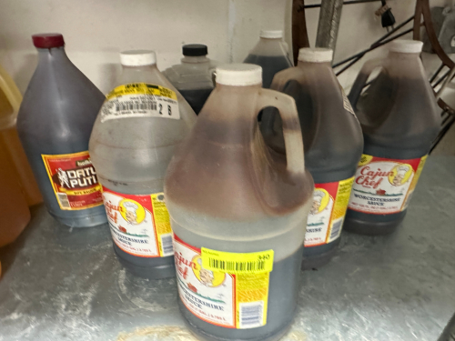 (7) ASSORTED BOTTLES OF CAJUN SAUCE - SOME OPEN