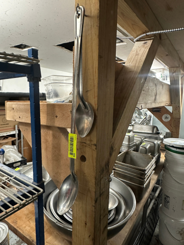 (2) LONG HANDLE STAINLESS SERVING SPOONS.