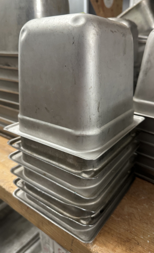(6) 1/6 SIZE STAINLESS INSERTS.