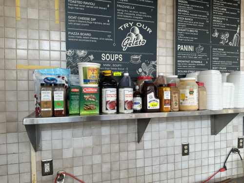 (1) LOT OF ASSORTED OPEN FOOD PRODUCT, SEASONINGS, AND PAPER PRODUCTS.