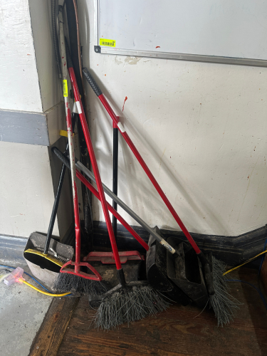 (1) LOT OF ASSORTED BROOMS AND DUST PANS