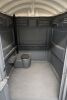 HANDICAP ACCESSIBLE PORTABLE RESTROOM / PORTA-POTTY WITH HEAVY-DUTY MOLDED PLASTIC CONSTRUCTION DESIGNED FOR DURABILITY AND EASY TRANSPORT. EXTRA-WIDE DOOR AND SPACIOUS INTERIOR PROVIDE WHEELCHAIR ACCESSIBILITY, FEATURING NON-SLIP FLOOR, INTERIOR HANDRAIL - 7