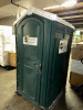 STANDARD PORTABLE RESTROOM / PORTA-POTTY WITH DURABLE MOLDED PLASTIC CONSTRUCTION DESIGNED FOR JOB SITES AND EVENTS. FEATURES INCLUDE VENTED ROOF, SECURE LOCKING DOOR, AND COMPACT FOOTPRINT FOR EASY PLACEMENT AND TRANSPORT. UNIT SHOWS NORMAL COSMETIC WEAR - 4