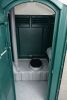 STANDARD PORTABLE RESTROOM / PORTA-POTTY WITH DURABLE MOLDED PLASTIC CONSTRUCTION DESIGNED FOR JOB SITES AND EVENTS. FEATURES INCLUDE VENTED ROOF, SECURE LOCKING DOOR, AND COMPACT FOOTPRINT FOR EASY PLACEMENT AND TRANSPORT. UNIT SHOWS NORMAL COSMETIC WEAR - 2