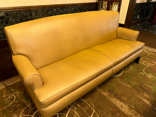 TWO CUSHION TAN LEATHER SOFA