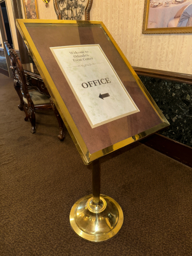 LARGE HEAVY DUTY METAL SIGN STAND W/ GLASS COVER.