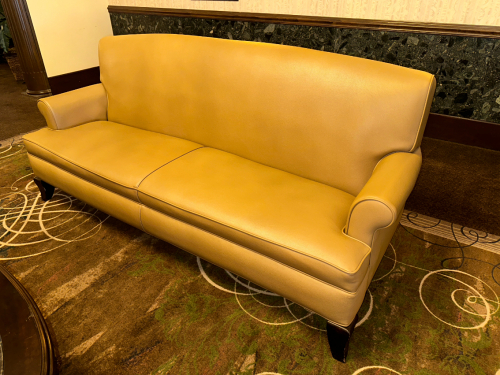 TWO CUSHION TAN LEATHER SOFA
