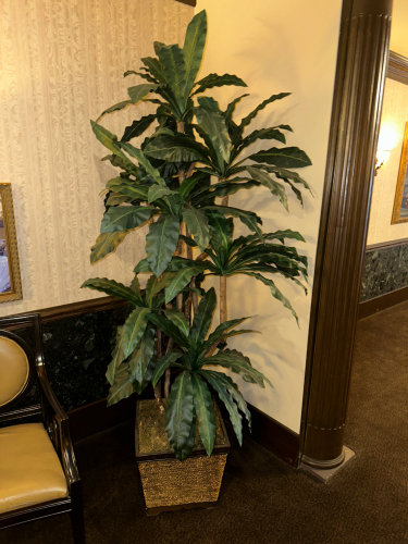 LARGE FAUX POTTED PLANT W/ PLANTER.
