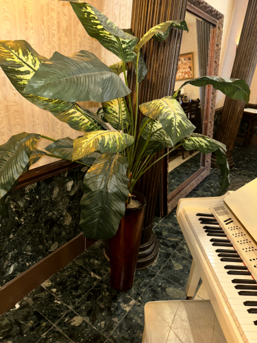 FAUX POTTED PLANT W/ PLANTER.
