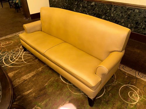 TWO CUSHION TAN LEATHER SOFA