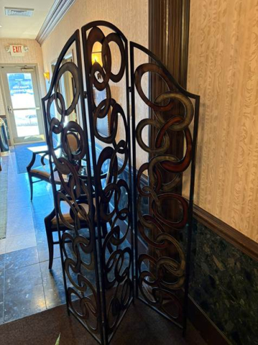 THREE PANEL FOLDING METAL ACCENT PARTITION.