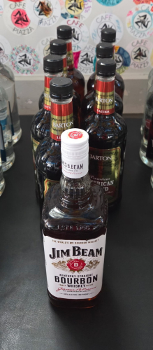 (1) BOTTLES OF JIM BEAM AND (8) BOTTLES OF BARTONS BOURBON