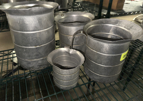 (4) PIECE ALUMINUM MEASURING CUP SET.