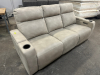 MACYS TAN LEATHER POWER RECLINING SOFA W/ WIRELESS CHARGER.