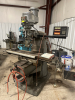 BRIDGEPORT SERIES II SPECIAL VERTICAL MILLING MACHINE EQUIPPED WITH 2 HP HEAD, HEAVY-DUTY KNEE, AND LARGE PRECISION WORK TABLE. INCLUDES ANILAM MINIWIZARD DIGITAL READOUT (DRO) FOR X AND Y AXIS POSITIONING