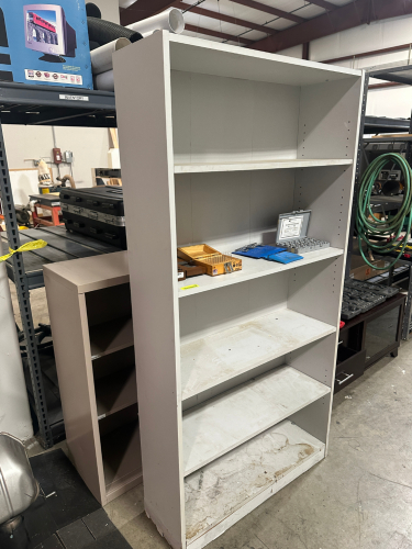 (2) ASSORTED METAL AND COMPOSITE WOOD BOOK SHELVES.