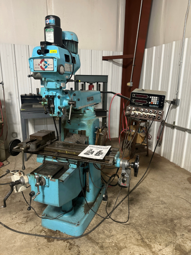 HURCO SM1 VERTICAL MILLING MACHINE WITH MANUAL CONTROLS AND TRADITIONAL KNEE-TYPE CONFIGURATION. EQUIPPED WITH ACU-RITE II DIGITAL READOUT FOR X AND Y AXIS POSITIONING AND ACCURATE MACHINING OPERATIONS.