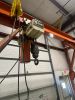 MOBILE STEEL GANTRY CRANE EQUIPPED WITH COFFING 5-TON ELECTRIC CHAIN HOIST AND HEAVY-DUTY STEEL I-BEAM. FEATURES RIGID WELDED FRAME, ROLLING CASTERS FOR SHOP MOBILITY, AND INTEGRATED POWERED HOIST WITH HOOK AND CHAIN AS SHOWN. - 2