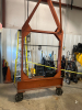 MOBILE STEEL GANTRY CRANE EQUIPPED WITH COFFING 5-TON ELECTRIC CHAIN HOIST AND HEAVY-DUTY STEEL I-BEAM. FEATURES RIGID WELDED FRAME, ROLLING CASTERS FOR SHOP MOBILITY, AND INTEGRATED POWERED HOIST WITH HOOK AND CHAIN AS SHOWN. - 6