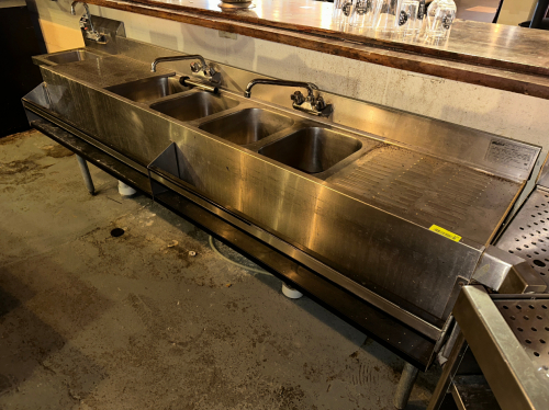 EAGLE FOUR WELL UNDER BAR STAINLESS SINK W/ LEFT AND RIGHT DRY BOARDS.