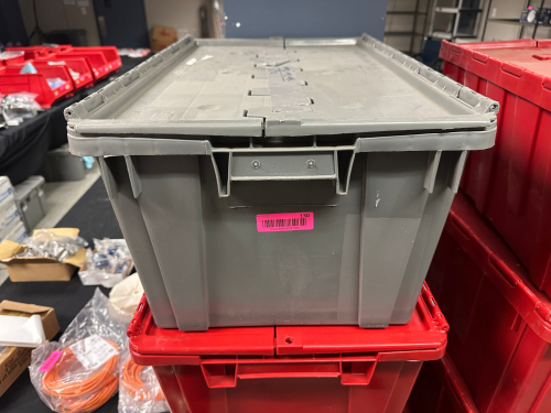 (6) RED AND GREY PLASTIC SHIPPING TOTES.
