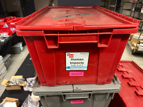 (6) RED AND GREY PLASTIC SHIPPING TOTES.