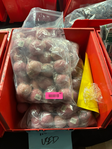 PLASTIC TOTE AND CONTENTS - RUBBER BOUNCY BALLS.