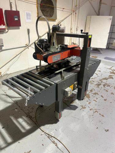 CARTON SEALING MACHINE