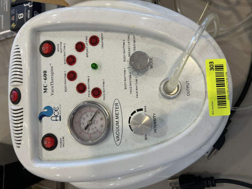 ACE MC-600 VACUUM THERAPY MACHINE WITH ADJUSTABLE INTENSITY CONTROL, MODE SELECTOR, VACUUM METER, AND OUTPUT PORT. POWERED ELECTRIC UNIT.