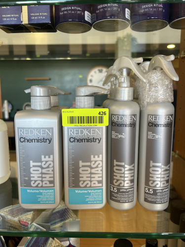 (11) ASSORTED BOTTLES OF PROFESSIONAL REDKEN HAIR TREATMENTS