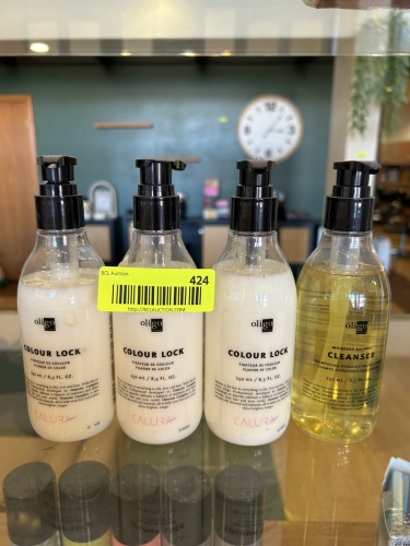 (4) ASSORTED BOTTLES OF OLIGO BEAUTY SUPPLIES.