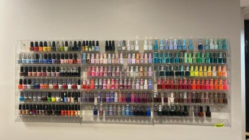 LARGE LOT OF OPENED NAIL POLISH AND NAIL POLISH RACKS