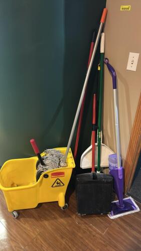 YELLOW PLASTIC MOP BUCKET AND WRINGER.