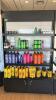 2 SECTIONS OF LIGHTED RETAIL SHELVING WITH 4 SHELVES AND BOTTOM COVERED STORAGE