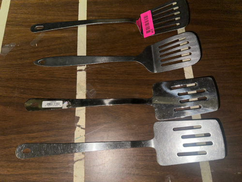 (4) STAINLESS TURNERS.
